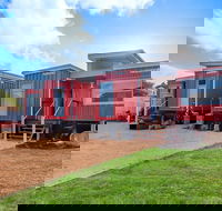Retro River Rest Luxury Shipping Container House - Accommodation Directory