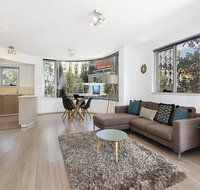 Lower Bridge and Sails - Executive 2BR Darlinghurst Apartment with Balcony and Rooftop Views - Accommodation Directory