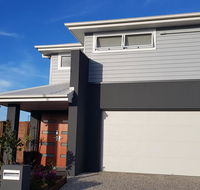Modern two-story Hampton Style house - Accommodation Directory