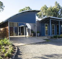 Corrugated Cottage - Accommodation Directory