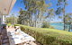 'Corlette Waterfront', 2/44 Danalene Parade - Waterfront Luxury, WIFI, Aircon, Boat Parking - thumb 1