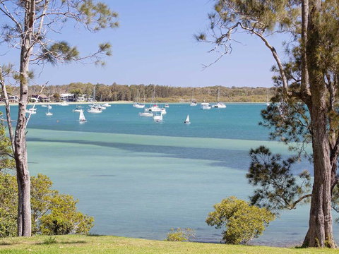 'Corlette Waterfront', 2/44 Danalene Parade - Waterfront Luxury, WIFI, Aircon, Boat Parking - Accommodation Directory 0