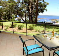 2 'Magnus Pines' 52-56 Magnus Street - stunning unit with aircon water views  foxtel - Accommodation Directory