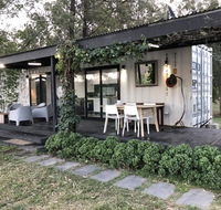 Absolute riverfront shipping container cabin - Accommodation Directory